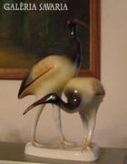 A pair of raven house birds: egrets