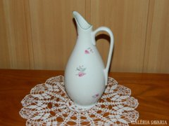An old, rare, raven-shaped carafe-shaped vase for a flower
