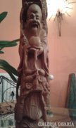 Régi trópusi fából faragott szobor