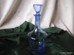 Torn, polished blue glass