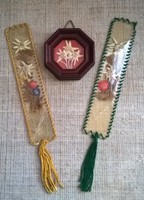 Old mountain hay pair with hanging wooden framed wall bookmarks
