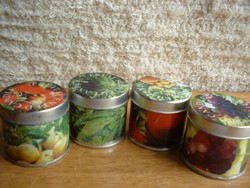 There are several types of scented candles in a metal box