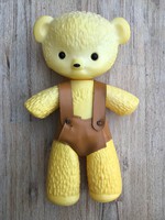 Retro yellow plastic game with teddy, teddy bear