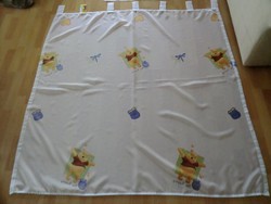 Children's room with pooh curtains with rods