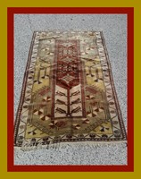 Kézi csomózású anatoliai török milas szőnyeg.