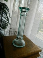 Table vase and candle holder in a pale green shade of glass