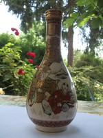 Antique Chinese hand-painted vase indicates.