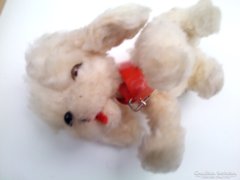 Small dog bent from old woolen wire with glass eyes