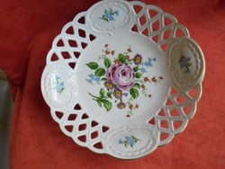Bowl of rosy porcelain with pierced edges