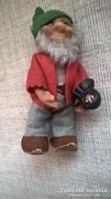 Antique small bearded beggar figure in postman's clothes