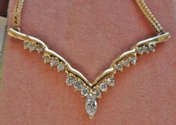 Szépséges 0,58ct gyémánt 14kt arany nyakék