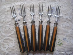 Antique pastry with forks
