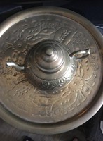 Old oriental copper bowl and spout