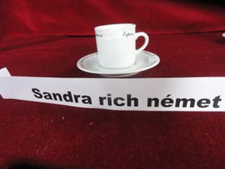 Designed by Sandra Rich German porcelain, coffee cup + placemat. He has!
