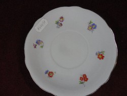 Zsolnay porcelain teacup coaster with small floral pattern. He has!