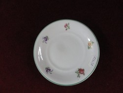 Plate of German porcelain cakes in Karis. Colorful flowers on a white background. He has!