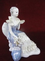 Porcelain figurative statue of Stipo Dorohoi. The princess is in a light blue lacy dress. He has!