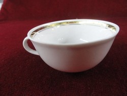 German porcelain coffee cup with a gold stripe on a snow-white background. He has!