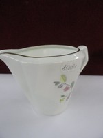 Polish porcelain milk jug, colorful flower and shape on a snow-white background. Gold border. He has!