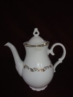 Mz Czechoslovak porcelain tea pourer. On a snow-white background with a golden border and pattern. He has!