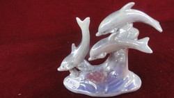 Porcelain light blue dolphin with 3 dolphins. He has!