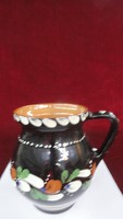 Sárospataki ceramic jug, hand painted. Its height is 14.5 cm. He has!