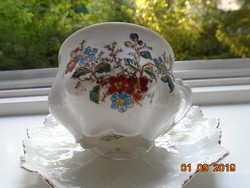 Mz austria gold-contoured art nouveau teacup, with laced checkered coaster