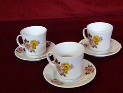 Lowland porcelain coffee cup + placemat. Floral pattern, showcase quality. He has!