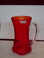 Red glass jar, 17 cm high, 9 cm in diameter.