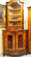 Baroque corner cabinet decorated with marquetry