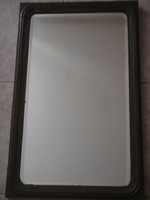 Large wall-mounted wooden mirror