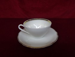 Kahla quality porcelain teacup + placemat. He has!