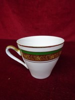 Quality Polish porcelain coffee cup with gold painting and green border. He has!