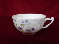 Antique German porcelain teacup with purple flower pattern. He has!
