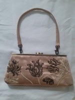 Casual bag decorated with gold beads