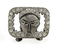 Antique jewelry: American art deco pendant with Frida Kahlo's face, xx. First third of the century