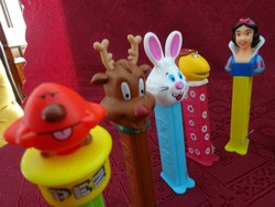 Pez candy dispenser, several kinds of figurines. He has!