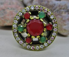Beautiful large handmade old ring with ruby and emerald colored stones
