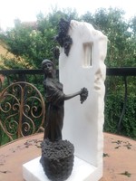 Woman picking grapes - bronze statue combined with marble