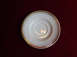 Lowland porcelain coffee cup placemat with a gold border and a diameter of 10.5 cm. He has!