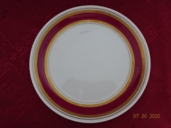 Quality Brazilian porcelain cake plate with burgundy/gold border. He has!