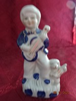 Porcelain figurine, a boy and his dog with a violin, height 15 cm. He has!