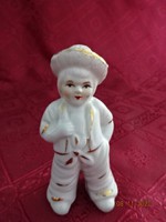 Porcelain figural statue, boy in a hat, height 10 cm. He has!