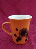 Ironstone porcelain cup, brown base with black pattern. He has!