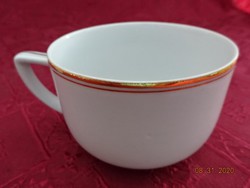 Kunz porcelain Austria, tea cup with gold border. He has!
