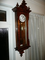 A large, 125 cm, heavy poplar veneer pewter German wall clock from the turn of the century