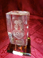 3D laser engraved glass block with the word love. Its height is 8 cm. He has!