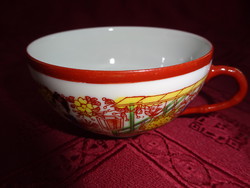 Japanese porcelain tea cup, geisha head inside. Its diameter is 9 cm. He has!
