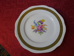 Bohemia Czechoslovak porcelain flat plate with a gold border and a bouquet of flowers in the middle. He has!