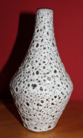 Retro white vase with holes